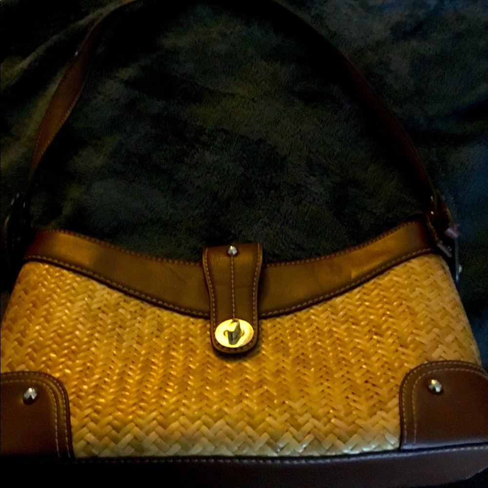 Leather trimmed woven straw bag